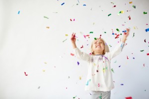 Kid throwing confetti Offering Child Care in Feasterville in PA